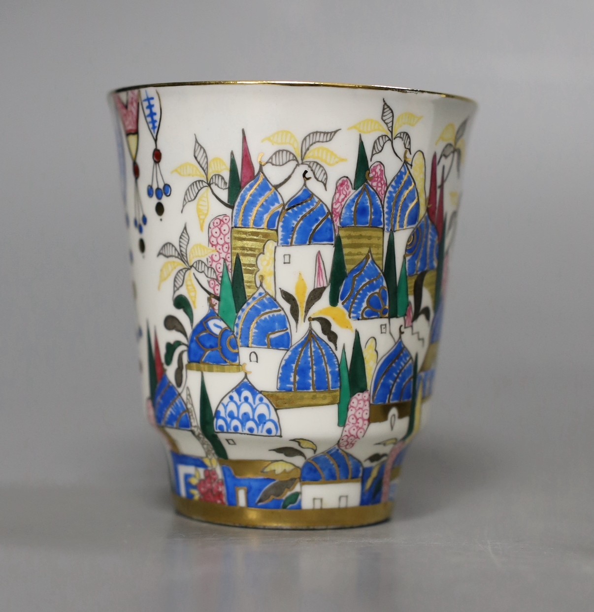 A Russian gilt enamel porcelain tea cup and saucer, cup 8cms high